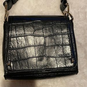 Schutz small leather bag in black.
